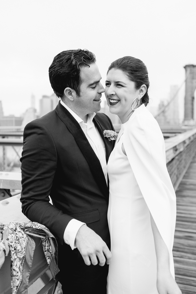 Classic black and white portrait of the bride and groom on the Brooklyn Bridge after their Brooklyn elopement