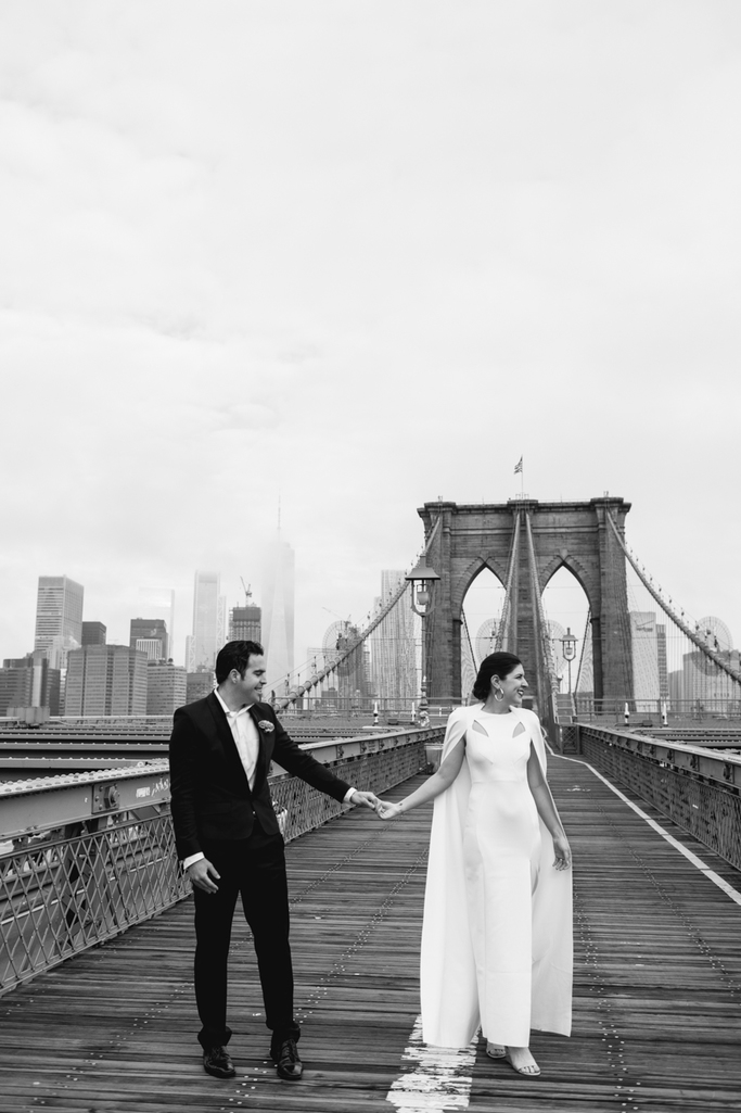 Classic black and white portrait of the bride and groom on the Brooklyn Bridge after their Brooklyn Elopement