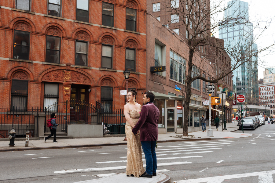 Bride and groom look out at the city during their East Village elopement