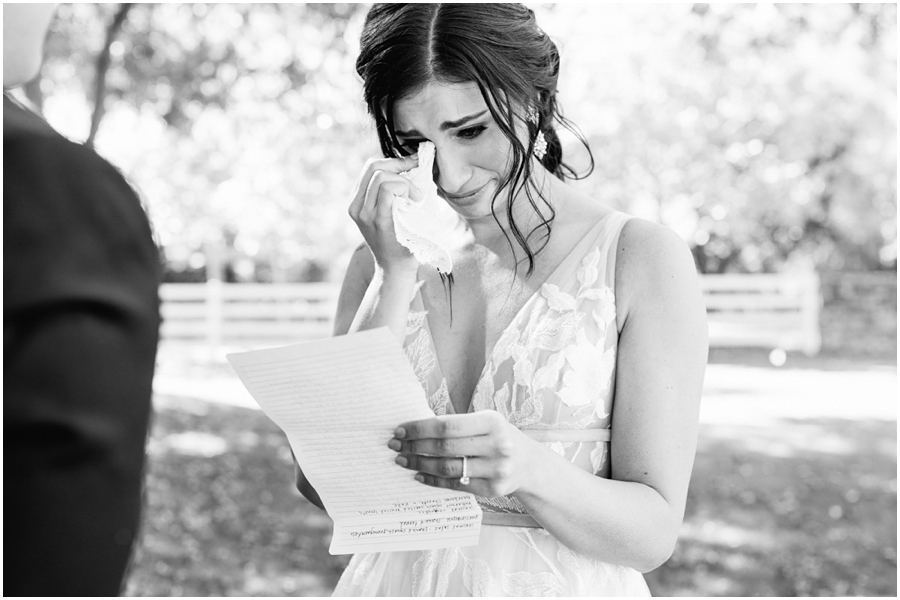 Bride cries during her vows on her wedding day in California