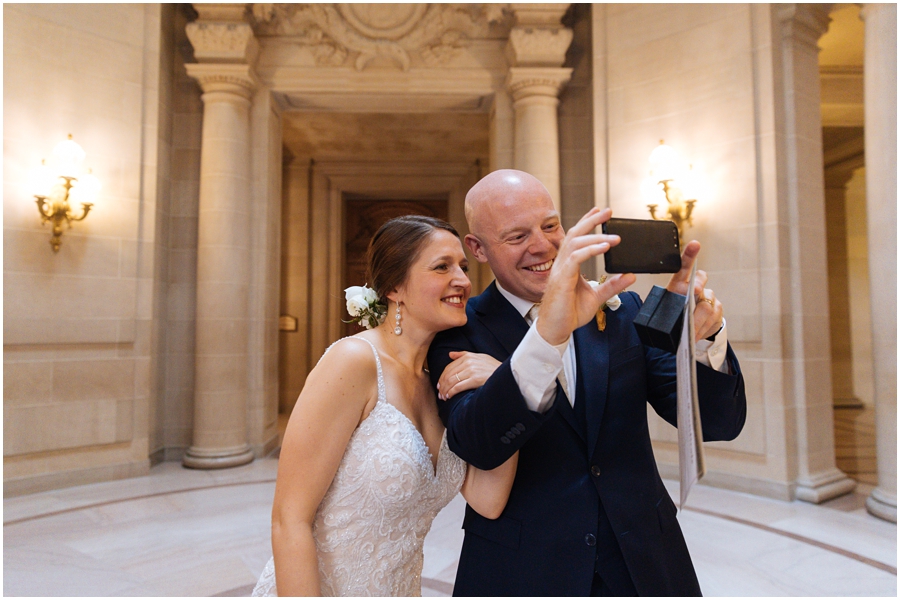 Bride and groom talk to their parents over Skype right after his ceremony at San Francisco City Hall