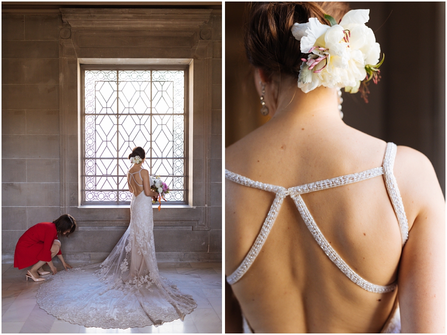 Bridesmaid fixes bride's dress during her San Francisco City Hall wedding