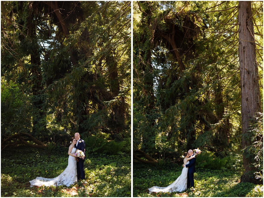 Bride and groom stand and kiss in the forest at the San Francisco Botanical Garden during their San Francisco picnic wedding reception