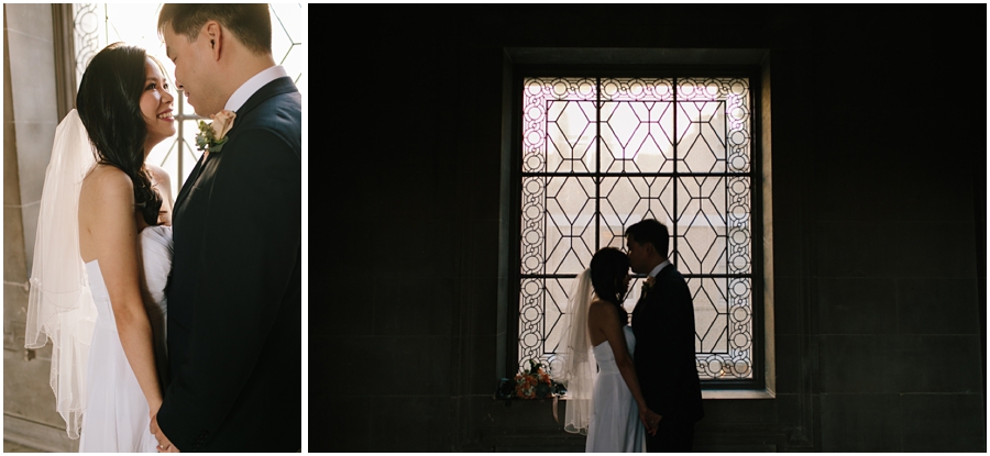 Couple smiles and laughs together during their San Francisco City Hall wedding