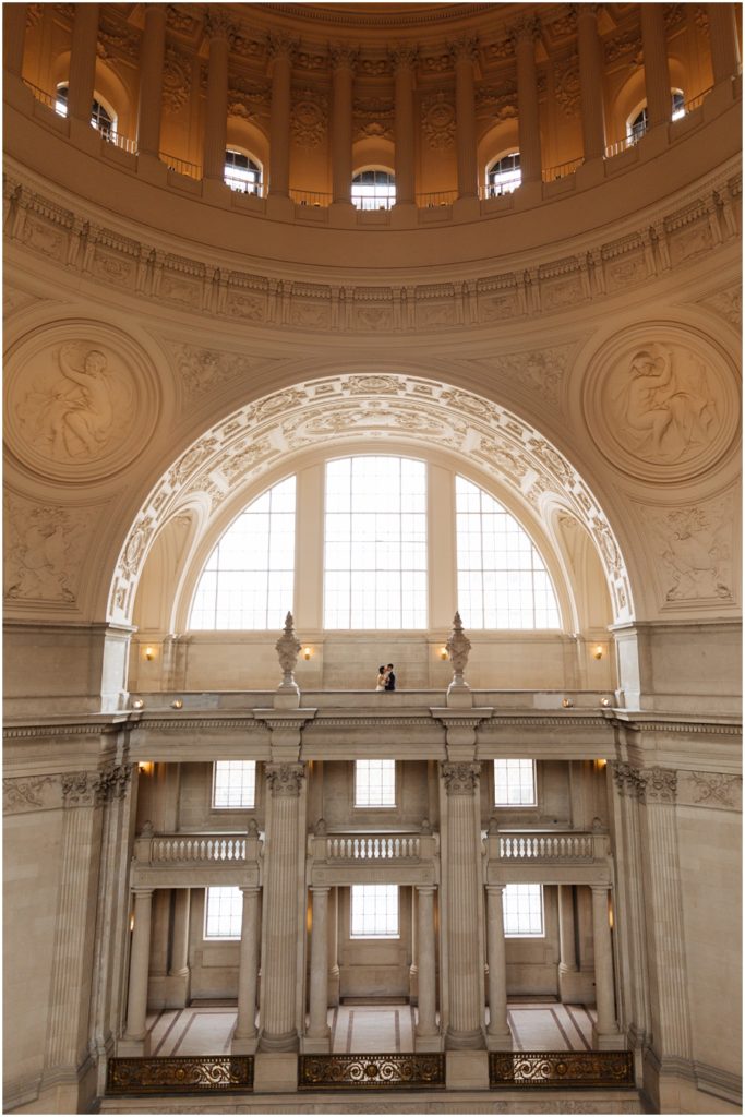 Couple in an empty San Francisco City Hall