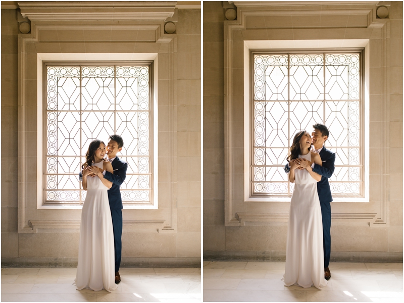 Couple laughs together during their San Francisco City Hall wedding