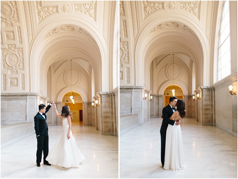 Couple twirls and kisses during their San Francisco City Hall wedding