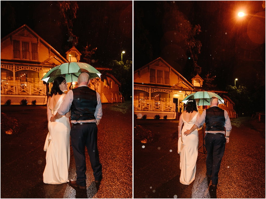 Bride and groom in the rain outside during their stern grove wedding
